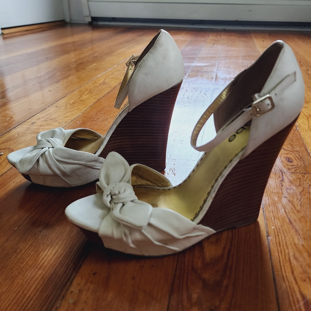 Bebe St. Bart's wedge in white.
